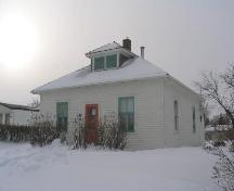 North elevation showing the front entrance and west side of the property, 2007.; Government of Saskatchewan, Brett Quiring, 2007.