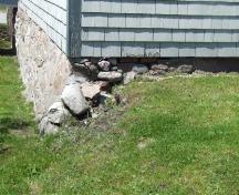 Stone rubble foundation, Coyle House, Shelburne, Nova Scotia, 2007.
; Heritage Division, NS Dept. of Tourism, Culture and Heritage, 2007.