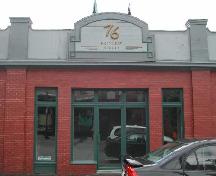 This image provides a view of the front entry surrounded by pilasters with tall capitals that form a part of the parapet above, 2005; City of Saint John