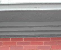 This image provides a view of the stone cornice, 2005.; City of Saint John