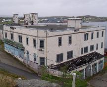 Fishermen's Union Trading Company Store, Port Union, NL, as seen from Holy Martyr's Church, June 2006.; HFNL/ Deborah O'Rielly 2006