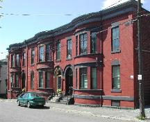 This photograph shows the 3 unit building looking south, 2005; City of Saint John