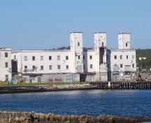View across waters off Port Union of Salt Fish Plant, Port Union, NL, June 2006.; HFNL / Deborah O'Rielly 2006
