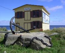 View of front facade and right side with mural, Fishermen’s Union Trading Company Cash Store, Musgrave Harbour, 2007.; HFNL 2007