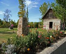 View of log house, from the southeast, at Sourisford Park, Coulter area, 2006; Historic Resources Branch, Manitoba Culture, Heritage, Tourism and Sport, 2006