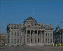 General view of the New Québec Custom House National Historic Site of Canada, showing the front elevation, 1982.; Parks Canada Agency / Agence Parcs Canada, 1982.
