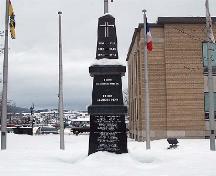 Front face of the monument in winter, in front of City Hall.; Madawaska Historical Society