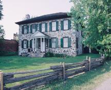 Corner view of the Ermatinger House, showing the façade and a side, 1995.; Parks Canada Agency/ Agence Parcs Canada, 1995.