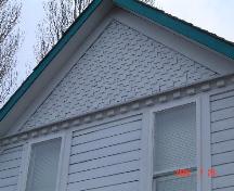 Detail view of the fishscale shingles on the Moir Residence.; Township of Langley, Julie MacDonald, 2004.