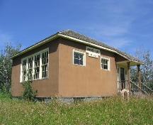 Front and side, showing west-facing window wall; Government of Saskatchewan, J. Bisson, 2004.
