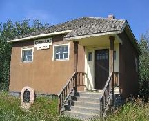 View of front windows and porch; Government of Saskatchewan, J. Bisson, 2004