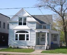 Decorative fish-scale shingles are an important feature of this Queen Anne style cottage.; City of Windsor, Bill Renaud