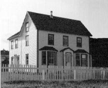 Exterior photo, front facade, Adams Home, Cape Onion.; Heritage Foundation of Newfoundland and Labrador 2004