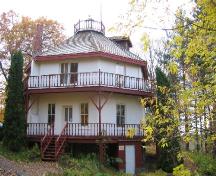 View of rear entrance to main floor and basement from embankment; Ministry of Culture 2006