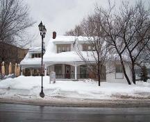 Photo of the front façade of the Emmerson House in winter.; Madawaska Historical Society