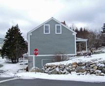 Side elevation showing steep grade at rear of house. Arthur Homer House, Barrington, NS, 2008.; Department of Tourism, Culture and Heritage, Province of Nova Scotia 2008