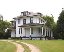 Contextual view, from the southeast, of the Demonstration Farm House, Killarney, 2005; Historic Resources Branch, Manitoba Culture, Heritage and Tourism, 2005