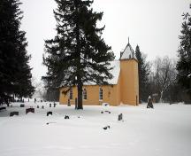 Contextual view, from the northwest, of St. Anne's Anglican Church, Poplar Point area, 2005; Historic Resources Branch, Manitoba Culture, Heritage and Tourism 2005
