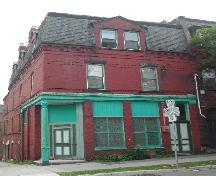 This photograph shows a contextual view of the building on Germain Street, 2005.; City of Saint John