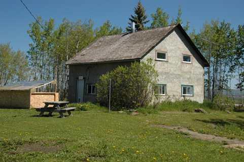 Log house (now stuccoed)