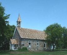 View of Balgonie United Church from southwest showing steeple reconstruction underway, 2004.; Government of Saskatchewan, Lisa Dale-Burnett, 2004.