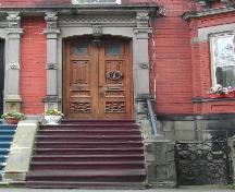 This image shows the segmented arch main entrance, 2005.; City of Saint John