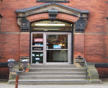 This image provides a view of the elaborate entablature over the main entrance, 2005.; City of Saint John
