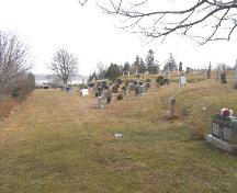 A view to the east down one of the avenues in Chebogue Cemetery, Rockville, Yarmouth County, 2008.; Heritage Division, NS Dept. of Tourism, Culture and Heritage, 2008