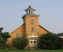 Front view of Saint Aloysius Roman Catholic Church featuring the brick tower, 2004.; Government of Saskatchewan, Dale-Burnett, 2004.