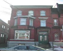 This photograph shows the contextual view of the building, 2005.; City of Saint John
