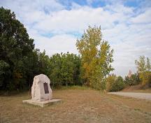 Contextual view, from the northeast, of the boulder and plaque marking the Millford Townsite, Treesbank area, 2006; Historic Resources Branch, Manitoba Culture, Heritage and Tourism, 2006