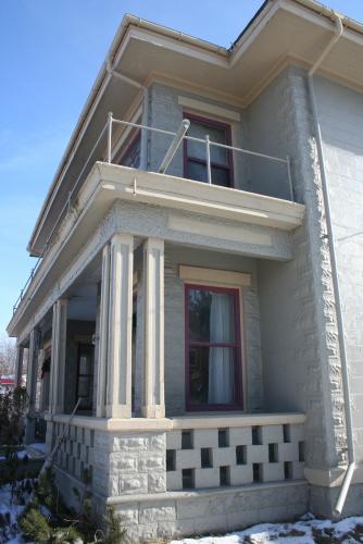 Showing quoins on corner of house