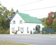 This image shows an oblique view of the front and side elevations of the house, 2007.; Village of Doaktown