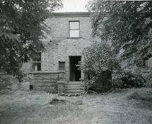 Main façade prior to restoration, showing visible shadow of original verandah covering – c. 1968; OHT, c. 1968