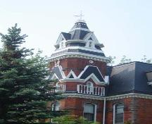 Of note are the third-storey arches, cresting and balustrade detailing.; Kayla Jonas, 2007
