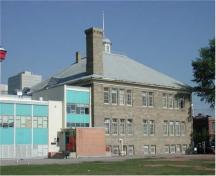 View showing original 1912 school and 1961 addition.; Simpson Roberts Architecture, Lorne Simpson, 2004.