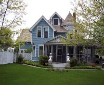 This image shows a view of the front façade of the house; The Valley District Planning Commision