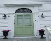 This photograph shows the entrance with fanlight and large entablature, 2007.; Town of St. Andrews