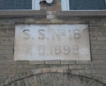 The date stone is located above the entrance door and the original building name is inscribed, 2007.; Lindsay Benjamin, 2007