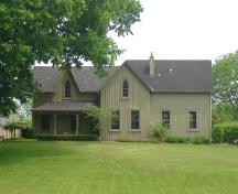 Of note is the bell-curved roof of the front porch.; Kayla Jonas, 2007.