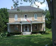 Of note are the twin chimneys and the decorative roof brackets.; County of Brant, Community and Development Services, 2007.