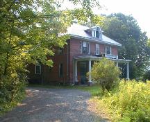 This image shows an oblique view of the residence on a large lot, 2007.; Province of New Brunswick