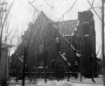 This photo from possibly the 1930's demonstrates that the Central United Church has changed very little of its exterior architectural features since its construction in 1916.; Moncton Museum