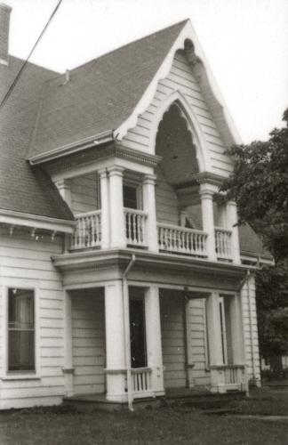Showing detail of centre gable with gothic arch