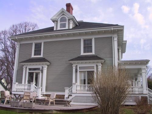 Showing south elevation with patio