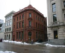 Contextual view, from the northeast, of the Canada Permanent Building, Winnipeg, 2006; Historic Resources Branch, Manitoba Culture, Heritage, Tourism and Sport, 2006