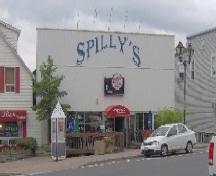 Front façade of Spilly's Resto-Bar, taken from in front of the Carrefour Assomption ; Madawaska Historical Society