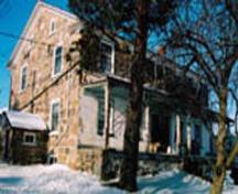 Of note is the stone construction and stucco verandah.; Township of Wilmot, 2007