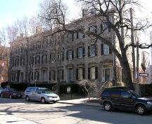 Front façade looking east showing details of the main façade, maturing trees and some context – 2006; OHT, 2006