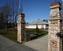 View through the park gates to the Gimli Dance Pavilion, Gimli, 2004; Historic Resources Branch, Manitoba Culture, Heritage, Tourism and Sport, 2005